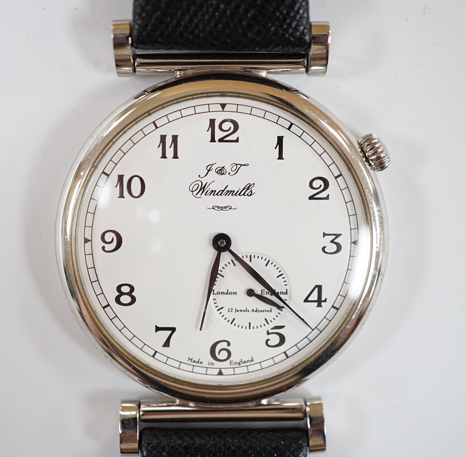 A gentleman's 2006 Joseph & Thomas Windmills Bartholomew First Edition white metal (stamped 950 for platinum) manual wind wrist watch, numbered 00144/00150, on leather strap with stainless steel deployment clasp, with or